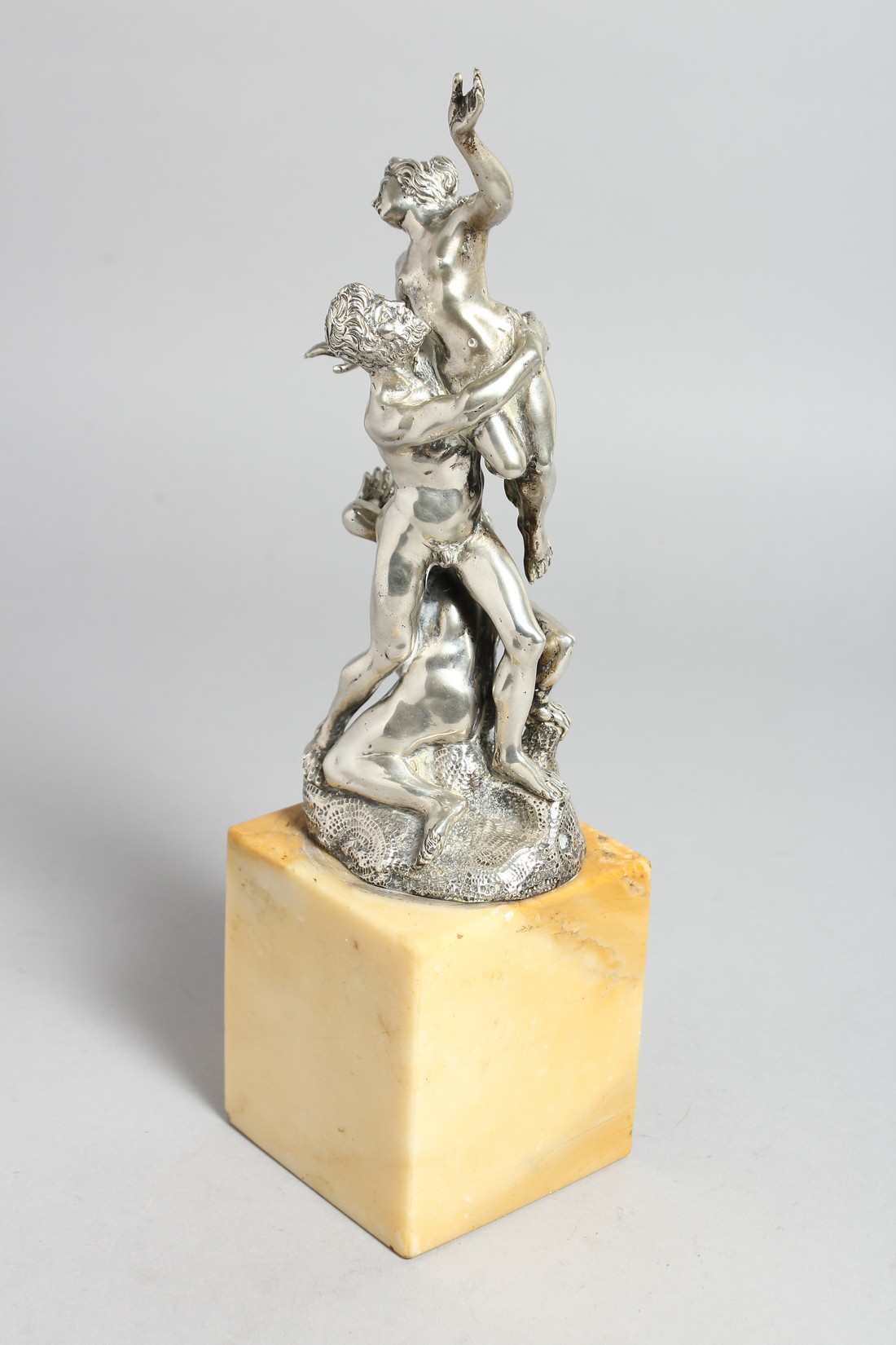 A SUPERB SILVER GROUP OF A CLASSICAL SCENE, TWO MEN AND A NUDE. 10ins high on a marble base. - Image 9 of 10