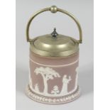 A WEDGWOOD JASPER WARE CIRCULAR BISCUIT CADDY AND COVER.