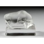 A FROSTED GLASS LALIQUE BULL on a reclining base. 4ins long