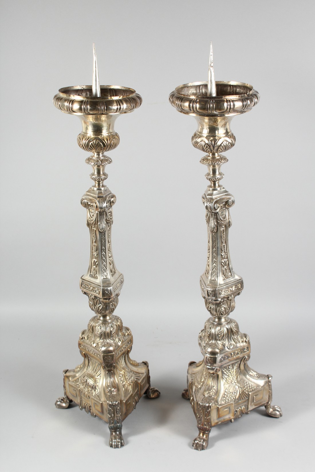 A GOOD PAIR OF CONTINENTAL SILVER PLATE PRICKET CANDLESTICKS. 30ins high. - Image 2 of 3
