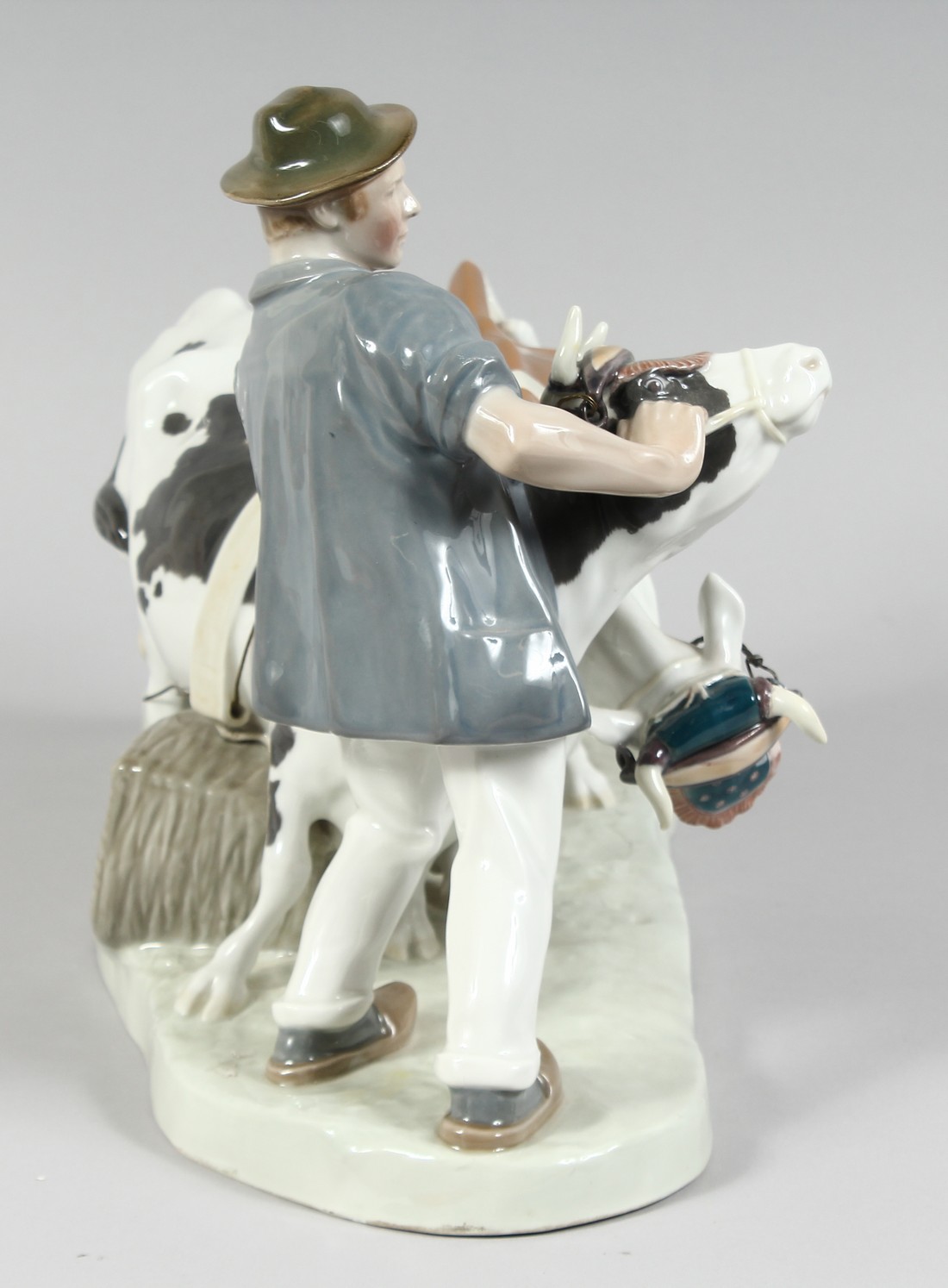 A LARGE MEISSEN GROUP, FARMER WITH TWO COWS. 16ins long, 11ins high. Cross swords mark in blue, - Image 2 of 9