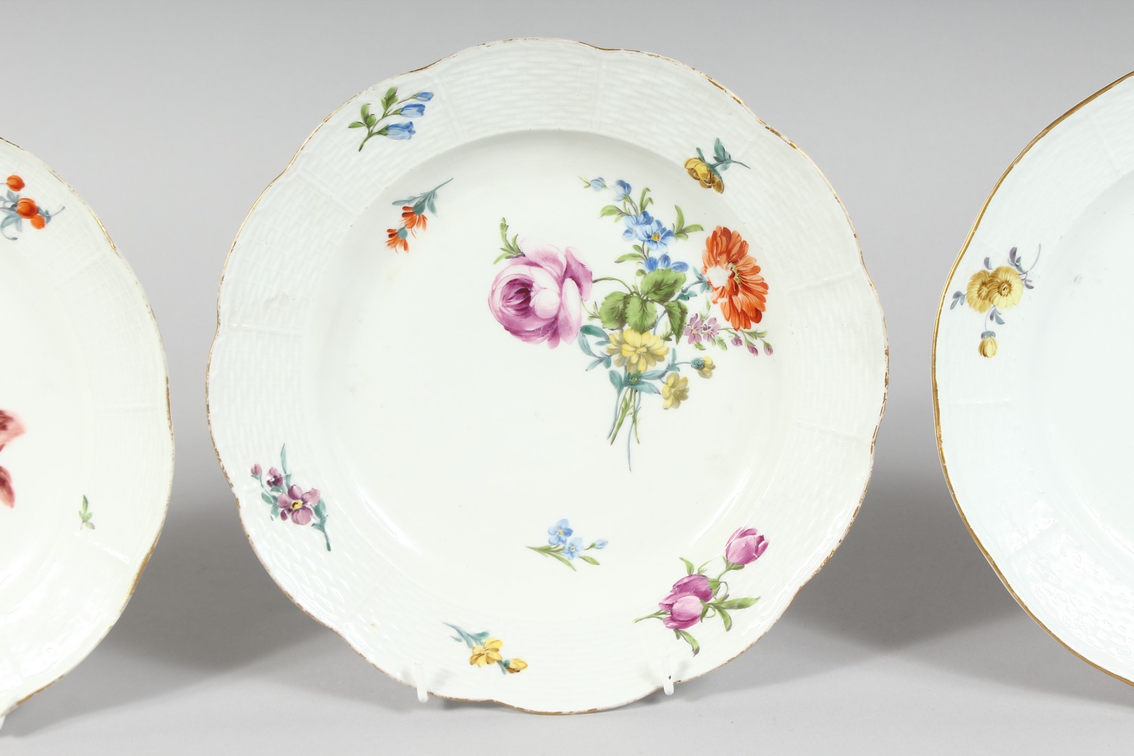 A SET OF THREE MEISSEN CIRCULAR PLATES sprigged and painted with flowers. Cross swords mark in blue. - Image 3 of 6