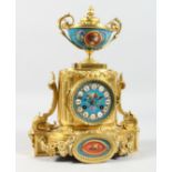 A VERY GOOD FRENCH BRONZE CLOCK with Sevres panels and urn finials. 12ins high.