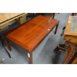 A mahogany rectangular coffee table.