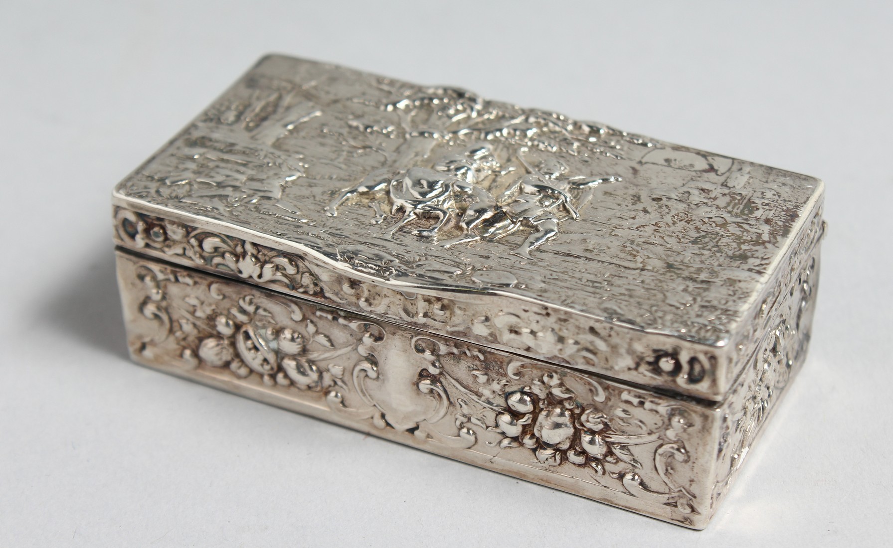 A RECTANGULAR DUTCH SILVER SNUFF BOX with impressed marks and B M. 2.75ins long.