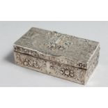 A RECTANGULAR DUTCH SILVER SNUFF BOX with impressed marks and B M. 2.75ins long.