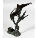 A SMALL ART DECO BRONZE OF A DOLPHIN AND A SHELL. 9.5ins high.