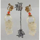 A PAIR OF CHINESE PIERCED JADE AND CORAL DROP EARRINGS