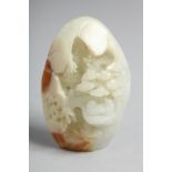 A CHINESE CARVED WHITE JADE PEBBLE. 2.25ins.
