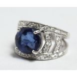 A SUPERB 18CT WHITE GOLD SAPPHIRE RING with diamond shoulders.