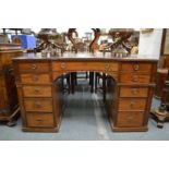 A good 19th century mahogany pedestal desk with leather inset top, concave fronted central frieze