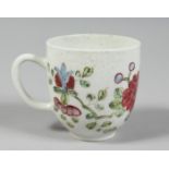 A BOW COFFEE CUP painted in famille rose style with a large chrysanthemum and trailing flowers.