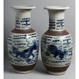 A PAIR OF CHINESE BLUE AND WHITE DRAGON CRACKLE GLAZE VASES.