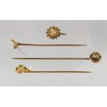 FOUR VARIOUS EDWARDIAN TIE PINS.