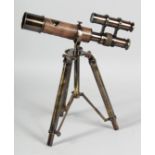 A TELESCOPE on a stand.