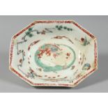 A VERY RARE BOW DRAGON PATTERN DISH painted with two crane-like birds in Kakiemon style, in need