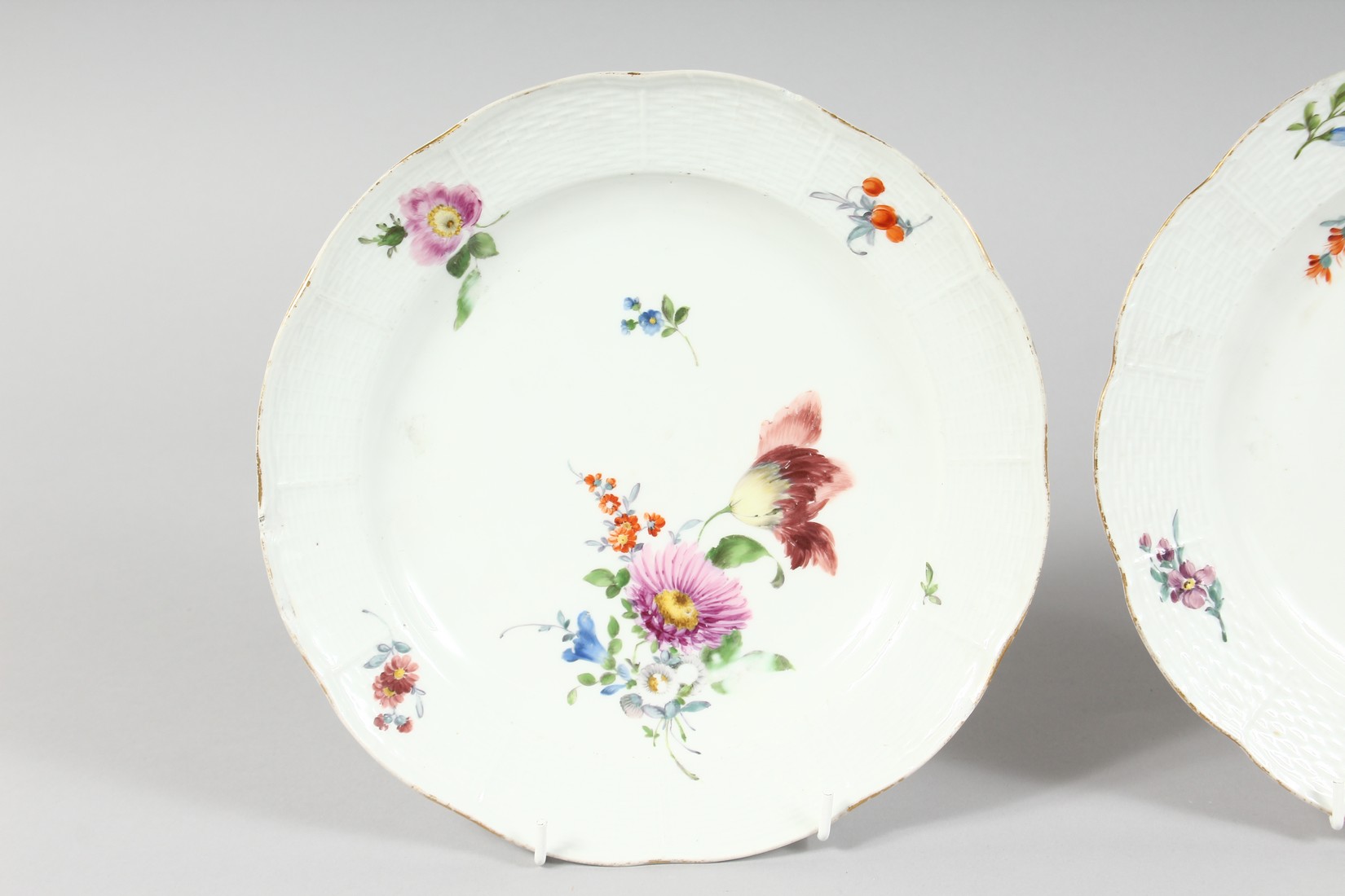 A SET OF THREE MEISSEN CIRCULAR PLATES sprigged and painted with flowers. Cross swords mark in blue. - Image 2 of 6