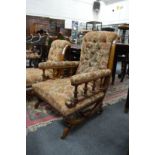 A good Victorian walnut library open armchair.