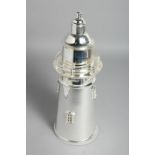 A SILVER PLATED LIGHTHOUSE COCKTAIL SHAKER.