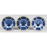 THREE SMALL 19TH CENTURY BLUE TIN GLAZE PLATES. 6ins diameter.