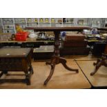 A 19th century mahogany tilt top tripod table with rounded rectangular top.