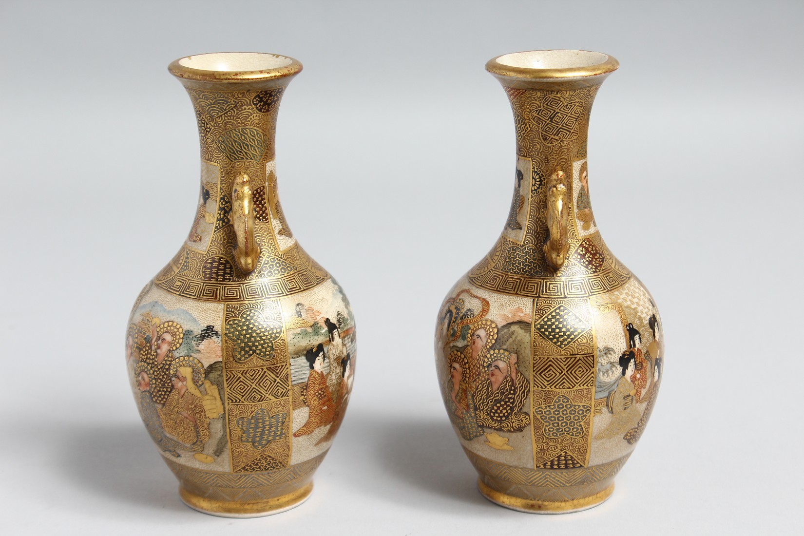 A PAIR OF SMALL JAPANESE SATSUMA PORCELAIN TWIN HANDLE VASES, painted with figures and gilt - Image 2 of 6