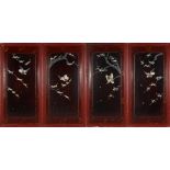 FOUR MOTHER OF PEARL AND ABALONE INLAID LACQUERED WOOD PANELS, each depicting birds and blossoming
