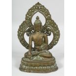 AN 18TH/19TH CENTURY TIBETAN OR NEPALESE BUDDHA, the reverse with traces of gilding, with detachable