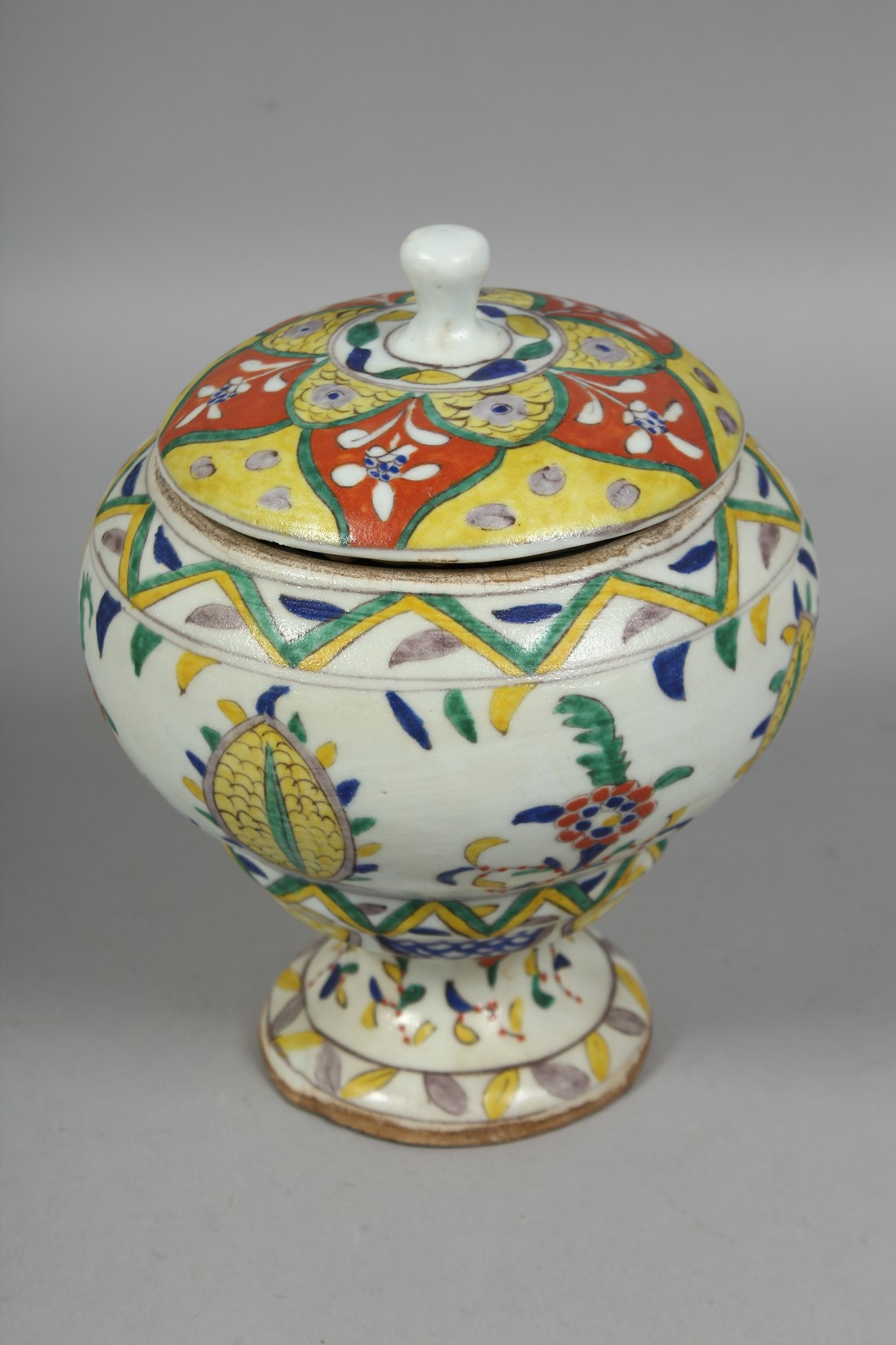A TURKISH KUTAHYA POTTERY PEDESTAL SUGAR BOWL AND COVER, painted with various floral motifs, overall - Image 3 of 8