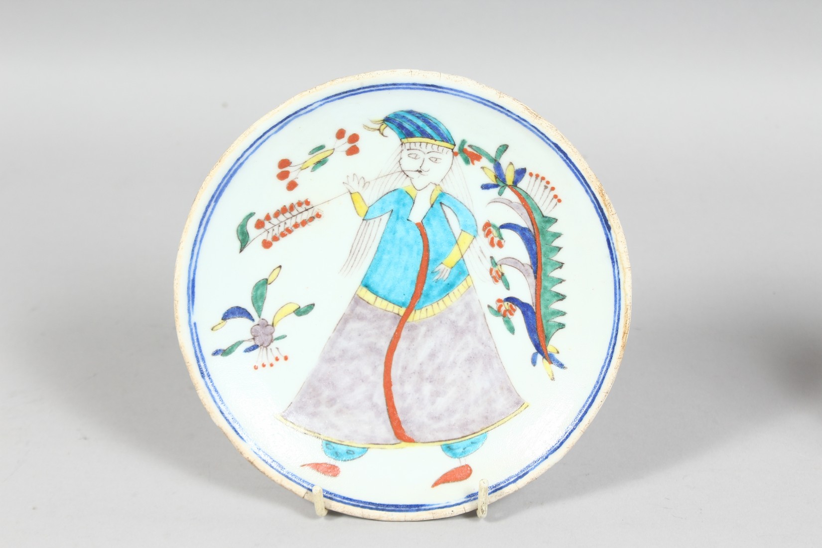 TWO TURKISH KUTAHYA GLAZED POTTERY DISHES, one painted with a figure, the other with a bird, each - Image 2 of 4