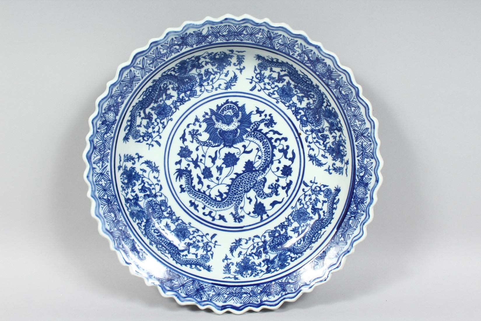 THREE LARGE CHINESE PORCELAIN DISHES, comprising two blue and white and one yellow ground dish; each - Image 4 of 8