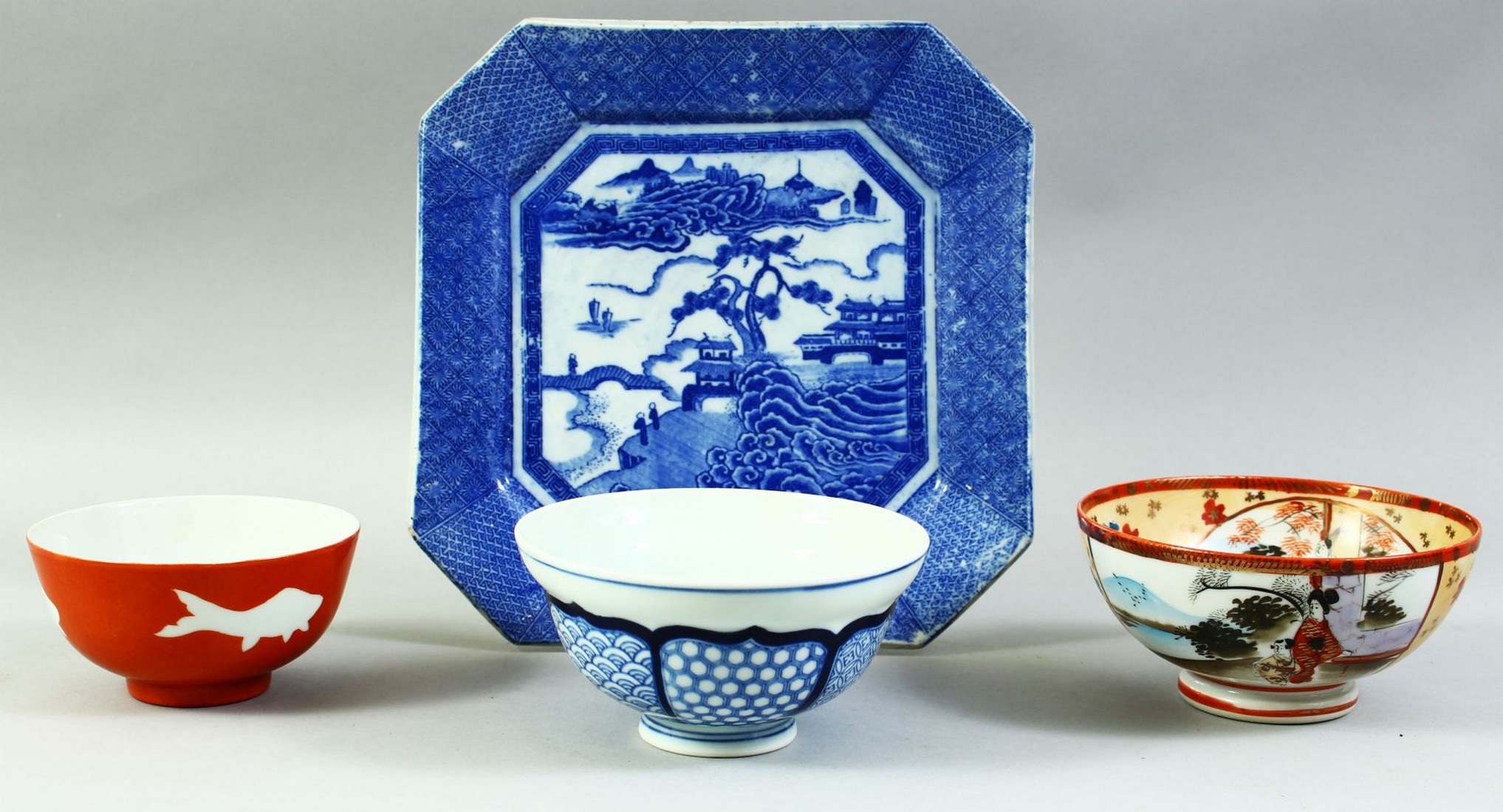 A COLLECTION OF THREE ORIENTAL PORCELAIN BOWLS, together with a blue and white square form plate, (