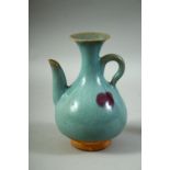 A CHINESE JUN STYLE GLAZED POTTERY EWER, 17cm high.