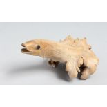 A JAPANESE CARVED WOOD FIGURE OF A FIGHTING FISH, fungus wood carving with naturalistic base, 18.5cm