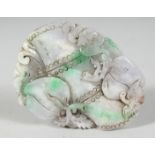 A GOOD CHINESE JADEITE CARVING depicting stylised peach blossom. 10cm x 8cm