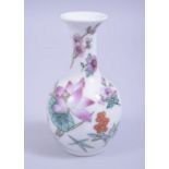 A 20TH CENTURY CHINESE REPUBLIC STYLE SMALL PORCELAIN VASE, decorated with flora and butterflies,