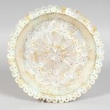 AN INDIAN GOA MOTHER OF PEARL DISH, 20cm diameter.