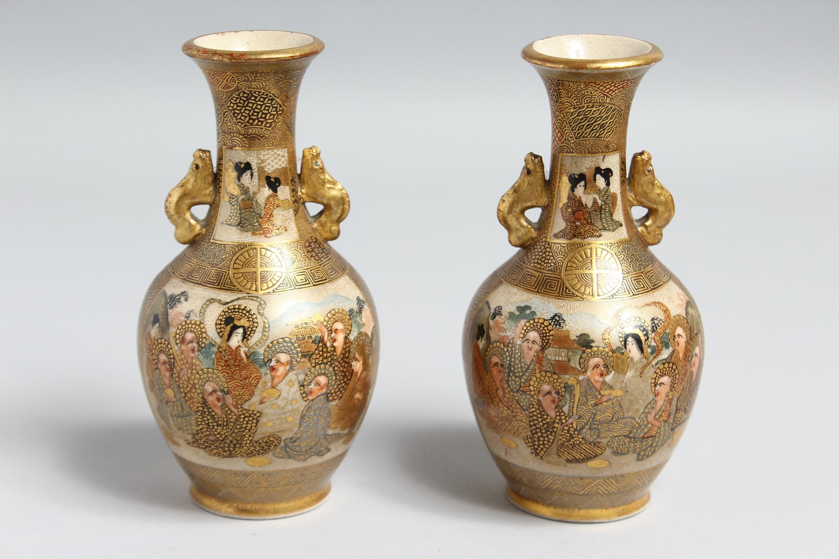 A PAIR OF SMALL JAPANESE SATSUMA PORCELAIN TWIN HANDLE VASES, painted with figures and gilt - Image 3 of 6