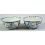 A PAIR OF CHINESE BLUE AND WHITE PORCELAIN BOWLS, each painted with figures, 14cm diameter.