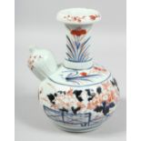 A JAPANESE IMARI PORCELAIN EWER, decorated with flowers, 21cm high.