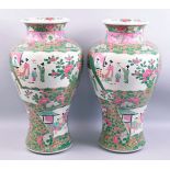 A LARGE PAIR OF CHINESE FAMILLE ROSE / VERTE PORCELAIN VASES, painted with panels of female