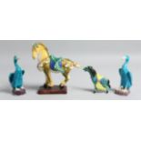 A COLLECTION OF FOUR CHINESE GLAZED POTTERY FIGURES OF ANIMALS, including a sancai horse, 14cm long;