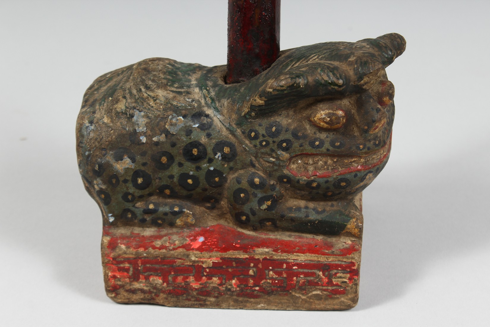 A CHINESE CARVED AND PAINTED STONE FIGURE OF A TEMPLE GUARDIAN, 15cm long. - Image 2 of 5