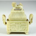 A CHINESE CARVED GREEN HARDSTONE TWIN HANDLE KORO AND COVER, the cover carved with foo dog, with