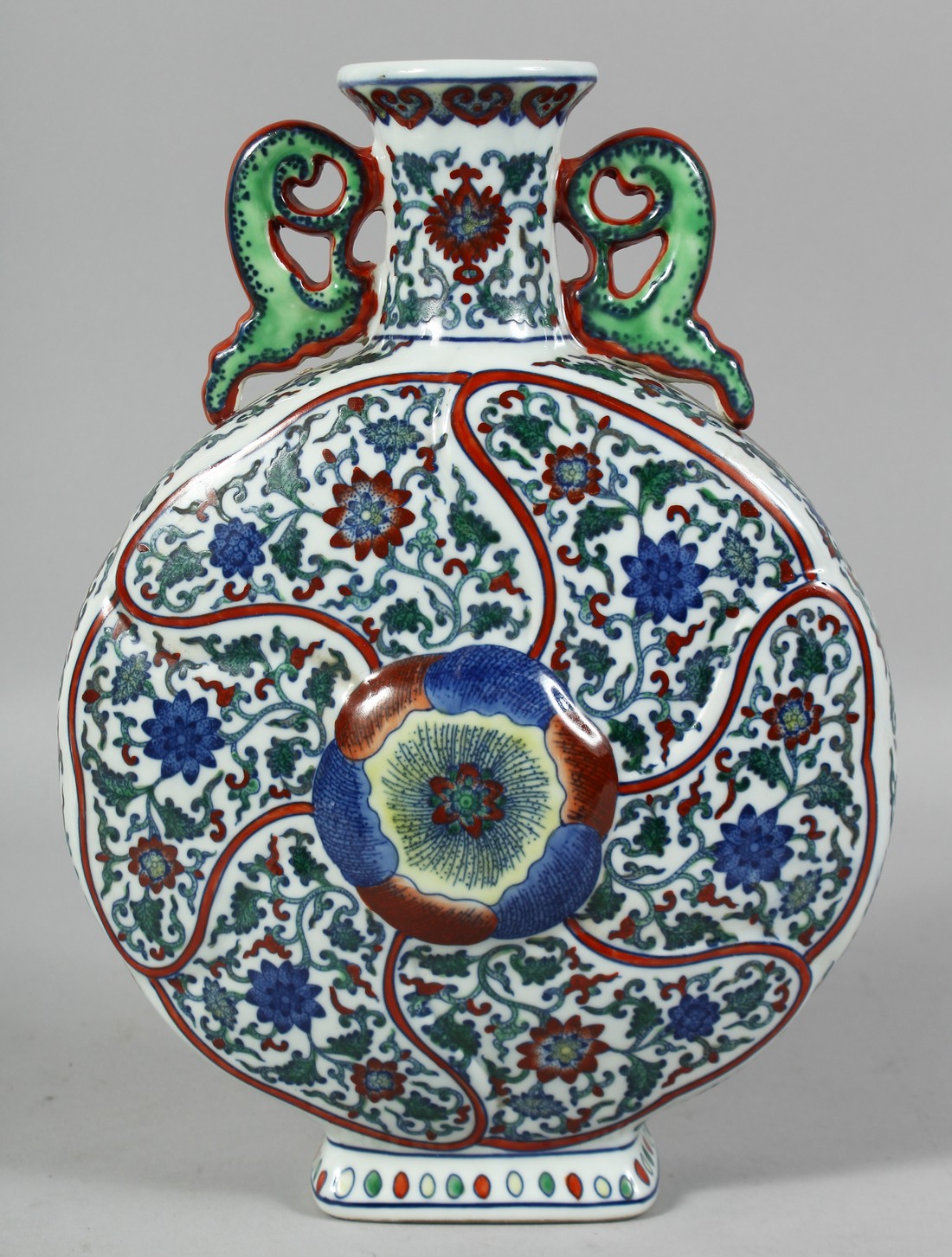 A LARGE CHINESE DOUCAI TWIN-HANDLED PORCELAIN MOON FLASK decorated all over with flowerhead and vine