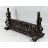 A GOOD LARGE CHINESE CARVED HARDWOOD SCREEN STAND, possibly zitan, carved and pierced with foliate