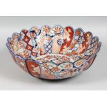 A LARGE 19TH CENTURY JAPANESE IMARI BOWL, with petal form rim, 31cm diameter.