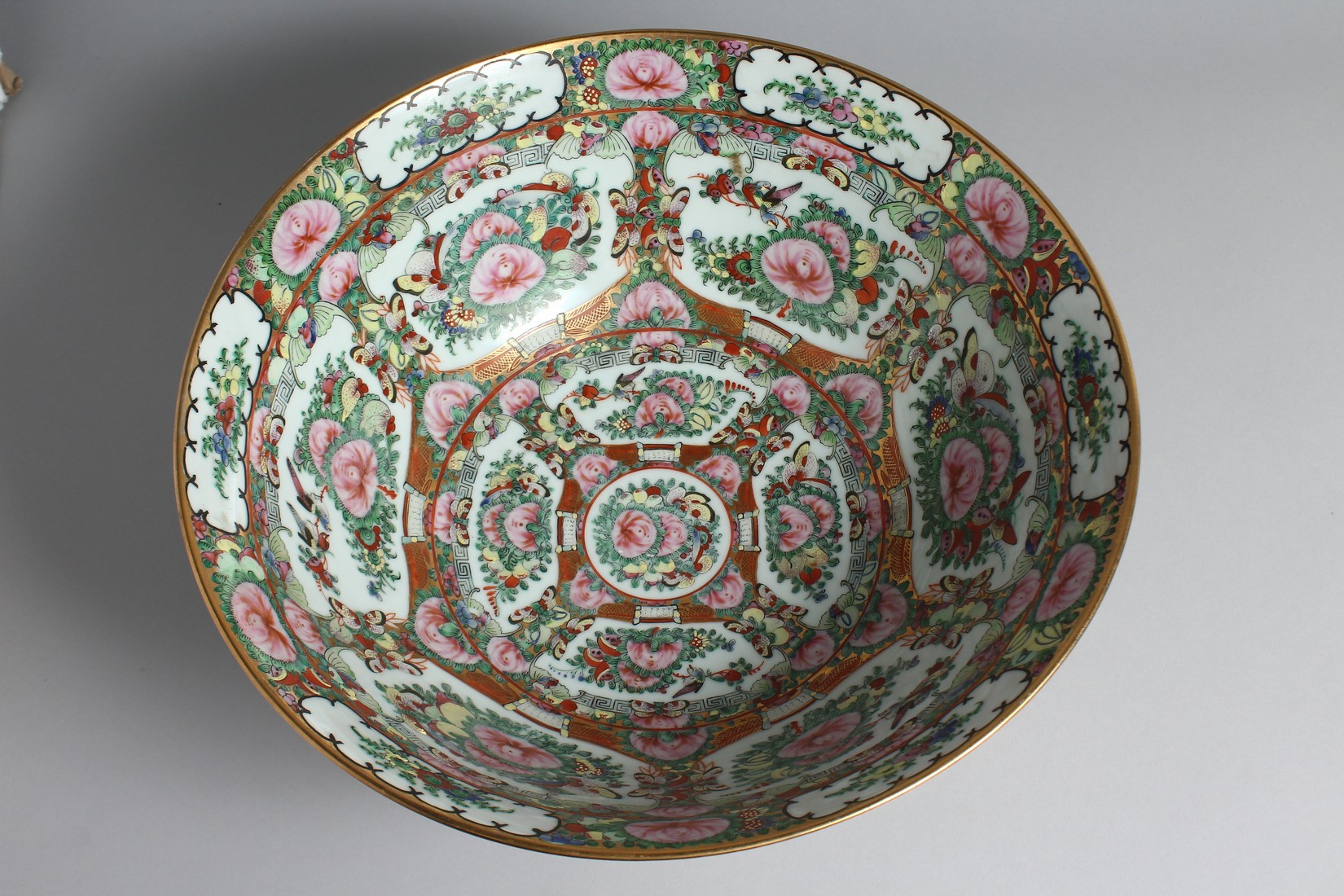 A LARGE CHINESE CANTON PORCELAIN PUNCH BOWL, painted with multiple panels of floral motifs and - Image 5 of 6