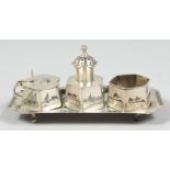 AN IRAQI SILVER NIELLO SILVER FOUR PIECE CRUET SET, (4).