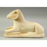 A CARVED STONE RECUMBENT RAM, possibly Egyptian, 26.5cm long